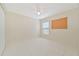 Bright bedroom with tile flooring, ceiling fan, and window coverings at 2073 Damascus Ln, Punta Gorda, FL 33983