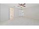 Bedroom with tile flooring and access to bathroom at 2073 Damascus Ln, Punta Gorda, FL 33983