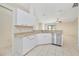 Kitchen boasts granite countertops and stainless steel appliances at 2073 Damascus Ln, Punta Gorda, FL 33983