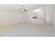 Spacious living room with tile flooring and ceiling fan at 2073 Damascus Ln, Punta Gorda, FL 33983