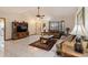 Bright and airy living room featuring comfortable furniture and a tile floor at 210 20Th W St, Bradenton, FL 34205