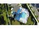 Community pool with lounge chairs and cabana at 274 Via Anina Dr, Sarasota, FL 34243