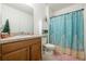Bathroom with shower/tub combo, vanity, and linen storage at 28214 Arrowhead Cir, Punta Gorda, FL 33982