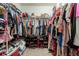 Large walk-in closet with ample hanging and shelving space at 28214 Arrowhead Cir, Punta Gorda, FL 33982
