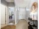 Inviting entryway with a decorative mirror and console table at 28214 Arrowhead Cir, Punta Gorda, FL 33982
