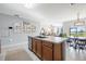 Kitchen with island, stainless steel appliances, and wood cabinets at 28214 Arrowhead Cir, Punta Gorda, FL 33982