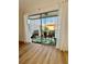 Private balcony with patio furniture and tropical view at 3504 Beneva Rd # 206, Sarasota, FL 34239