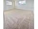 Spacious bedroom with neutral carpeting and large windows at 3504 Beneva Rd # 206, Sarasota, FL 34239