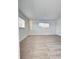 Bright and airy bedroom featuring neutral carpeting and ample natural light at 3504 Beneva Rd # 206, Sarasota, FL 34239
