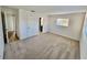 Large bedroom with plush carpeting, and access to other rooms at 3504 Beneva Rd # 206, Sarasota, FL 34239