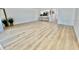 Bright living room with light wood-look flooring at 3504 Beneva Rd # 206, Sarasota, FL 34239