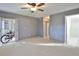 Main bedroom with private balcony access and ceiling fan at 3620 Ironwood Cir # 206O, Bradenton, FL 34209