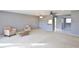 Living room with access to the lanai and plenty of natural light at 3620 Ironwood Cir # 206O, Bradenton, FL 34209