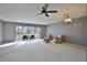 Living room with access to the lanai and plenty of natural light at 3620 Ironwood Cir # 206O, Bradenton, FL 34209