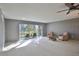 Living room with access to the lanai and plenty of natural light at 3620 Ironwood Cir # 206O, Bradenton, FL 34209