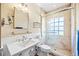 Updated bathroom with a walk-in shower, glass enclosure, and modern vanity at 401 Walls Way, Osprey, FL 34229