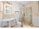 Bathroom with a large shower, sink, and toilet at 401 Walls Way, Osprey, FL 34229