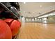 Exercise room with large exercise balls and hardwood floors at 401 Walls Way, Osprey, FL 34229