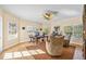 Bright home office with large windows and built-in shelving at 401 Walls Way, Osprey, FL 34229