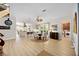 Eat-in kitchen with island, stainless steel appliances, and laundry area at 401 Walls Way, Osprey, FL 34229