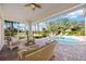 Inviting pool area with patio furniture, offering a tranquil outdoor space at 401 Walls Way, Osprey, FL 34229