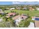 Golf course community with upscale homes and solar energy features at 4211 Palacio Dr, Sarasota, FL 34238