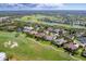 Community overview showcasing a golf course and serene waterways at 4211 Palacio Dr, Sarasota, FL 34238