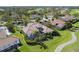 Luxury homes surround a golf course in this tranquil community at 4211 Palacio Dr, Sarasota, FL 34238