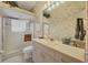 Well-lit bathroom with a shower and vanity at 4211 Palacio Dr, Sarasota, FL 34238