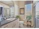 Clean bathroom with updated vanity and a walk-in shower at 4211 Palacio Dr, Sarasota, FL 34238