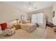 Relaxing bedroom with a comfortable seating area at 4211 Palacio Dr, Sarasota, FL 34238