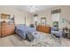 Spacious bedroom with a comfortable bed and plenty of storage at 4211 Palacio Dr, Sarasota, FL 34238