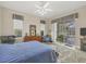 Bright bedroom with sliding doors leading to the pool area at 4211 Palacio Dr, Sarasota, FL 34238