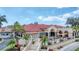 Building exterior with patio and landscaping at 4211 Palacio Dr, Sarasota, FL 34238