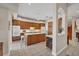 Well-equipped kitchen with wood cabinets, an island, and a wine rack at 4211 Palacio Dr, Sarasota, FL 34238