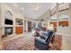 Bright living room with high ceilings and access to backyard at 4211 Palacio Dr, Sarasota, FL 34238