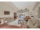 Comfortable living room showcasing a view of the pool through sliding glass doors at 4211 Palacio Dr, Sarasota, FL 34238