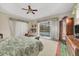 Main bedroom with sliding doors leading to the pool area at 4211 Palacio Dr, Sarasota, FL 34238