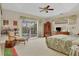 Main bedroom with pool view and large walk-in closet at 4211 Palacio Dr, Sarasota, FL 34238