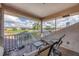 Relaxing screened balcony overlooking a lush golf course at 4211 Palacio Dr, Sarasota, FL 34238