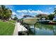 Private boat dock with lift, perfect for boat enthusiasts at 510 Bowsprit Ln, Longboat Key, FL 34228