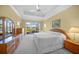 Main bedroom with water views and walk-in closet at 521 Luminary Blvd, Osprey, FL 34229