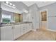 Double vanity bathroom with a large walk-in shower and separate soaking tub at 5403 Tidewater Preserve Blvd, Bradenton, FL 34208