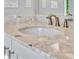 Bathroom vanity with a round sink and speckled countertop at 5403 Tidewater Preserve Blvd, Bradenton, FL 34208