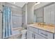 Modern bathroom with a bathtub, shower, and updated vanity at 5403 Tidewater Preserve Blvd, Bradenton, FL 34208