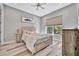 Bedroom with wood flooring and calming decor at 5403 Tidewater Preserve Blvd, Bradenton, FL 34208