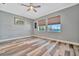 Bedroom with water views and wood-look floors at 5403 Tidewater Preserve Blvd, Bradenton, FL 34208