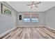 Bedroom with water views and wood-look floors at 5403 Tidewater Preserve Blvd, Bradenton, FL 34208