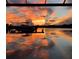 Stunning sunset view over the water from a private boat dock at 5403 Tidewater Preserve Blvd, Bradenton, FL 34208