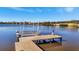 Private dock with lift offers convenient water access at 5403 Tidewater Preserve Blvd, Bradenton, FL 34208